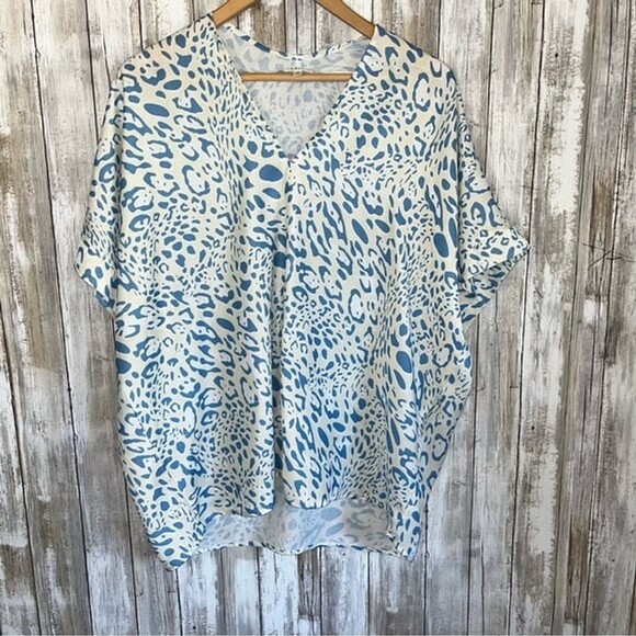 JODIFL Tops - Jodifl Cream & Blue Animal Print Oversized Whimsy Blouse